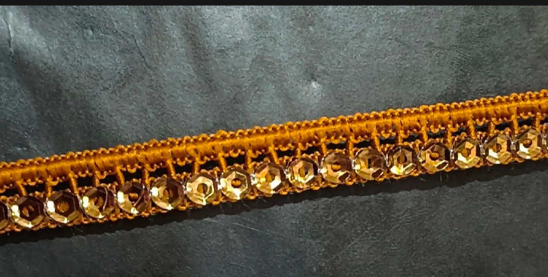 Fancy sequence shuttle lace reasonable price 3 yards 